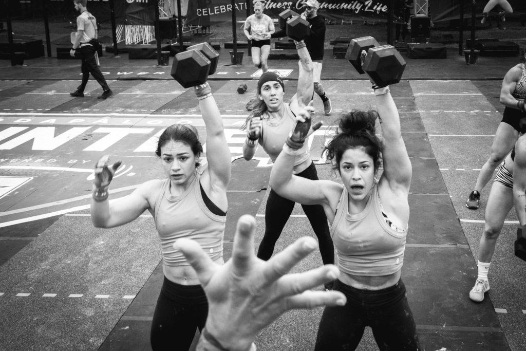 Women listing barbells